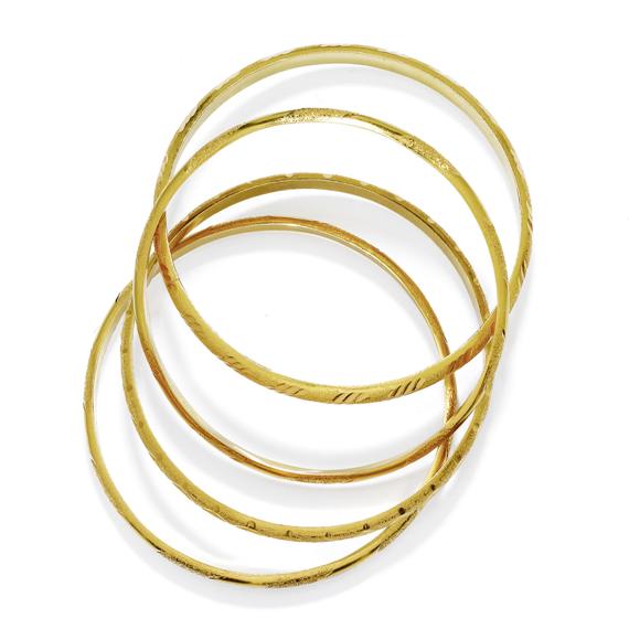 Appraisal: SET FOUR GOLD BANGLES Yellow gold g Four decorative bangles