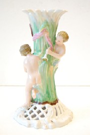 Appraisal: 'S CONTINENTAL PORCELAIN CHERUB CANDLE BASE