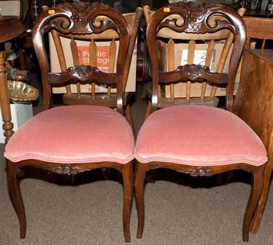 Appraisal: Pair of Victorian carved walnut upholstered side chairs Estimate -