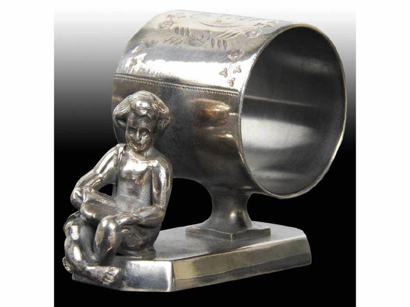 Appraisal: Draped Cherub Reading Book Figural Napkin Ring Description Pedestaled napkin