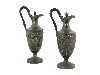 Appraisal: TWO HOT WATER JUGS of shield shape and embossed with