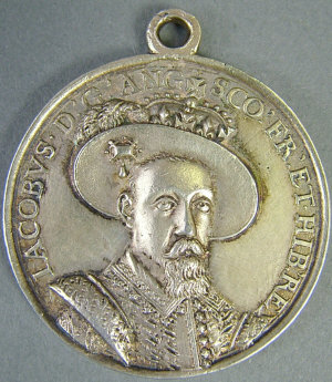 Appraisal: A James I cast silver commemorative medal Peace between England