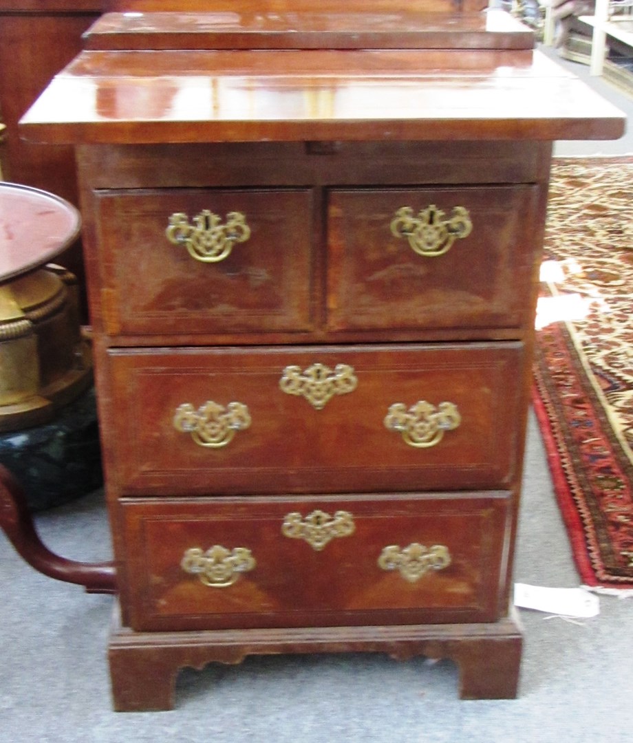 Appraisal: An th century style feather banded small mahogany chest the