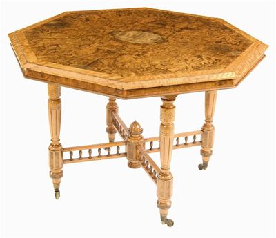 Appraisal: A late Victorian burr walnut and satinwood centre table the