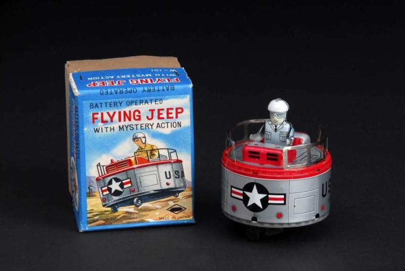 Appraisal: Flying Jeep Toy Description Japanese Made by S E Working