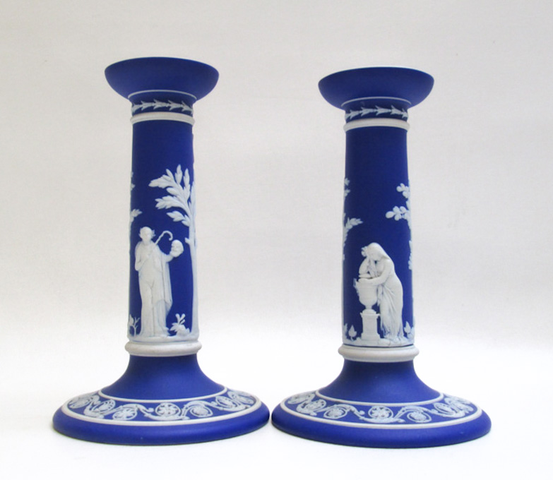 Appraisal: PAIR OF WEDGWOOD JASPERWARE CANDLESTICKS with classical white figures on