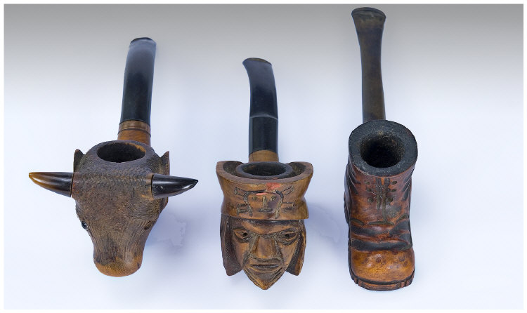 Appraisal: Three Carved Pipes Realistically Modelled In The Form Of A