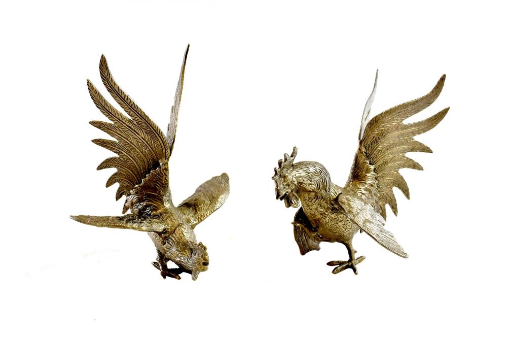 Appraisal: PAIR OF CONTINENTAL SILVER PLATE ROOSTERSEach with wings cocked Height