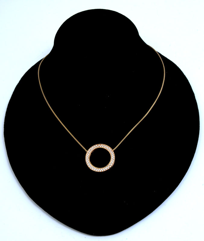 Appraisal: K CIRCLE PENDANT NECKLACE WITH CTW DIAMONDS K yellow gold