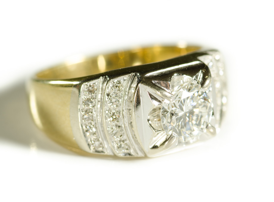 Appraisal: MAN'S DIAMOND AND FOURTEEN KARAT GOLD RING The yellow and