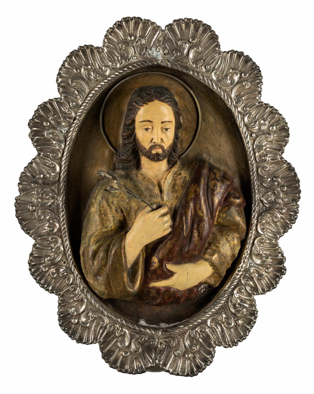 Appraisal: JESUS SANTO PLAQUEpainted wood and repousse metal Condition separation to