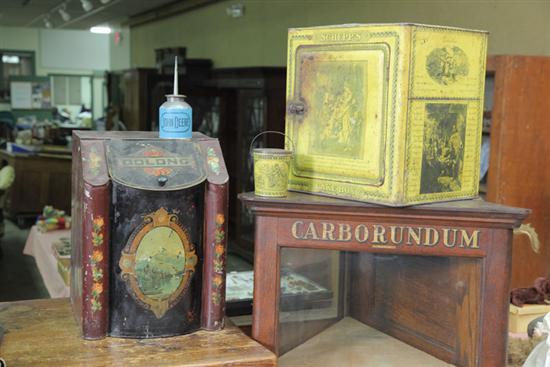 Appraisal: GROUP OF FOUR ADVERTISING TINS Including one yellow Schepp's cake