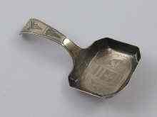 Appraisal: A Georgian silver caddy spoon the bowl rectangular with cut