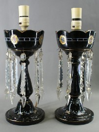 Appraisal: A pair of Victorian black glass lustres painted with enamel