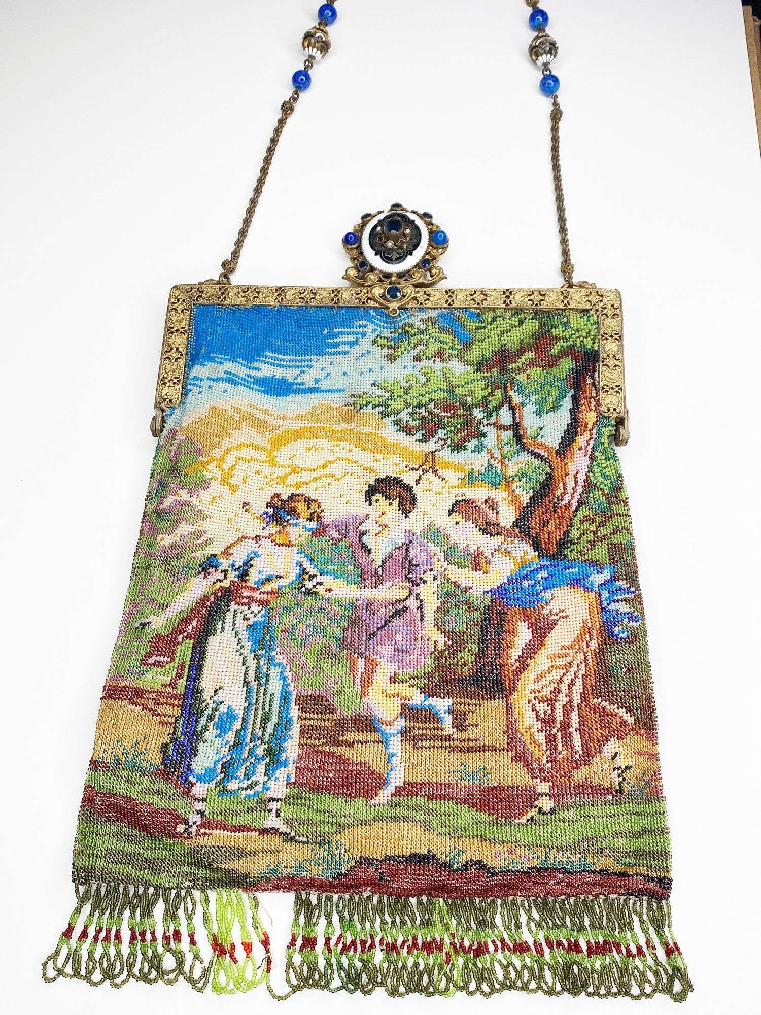 Appraisal: Micro Beaded Hand Bag with Children Playing long at widest