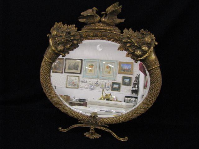 Appraisal: Ornate Brass Dressing Mirror double cornucopia swan decor oval