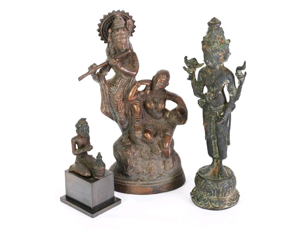 Appraisal: THREE FAR EAST CAST BRONZE BODDHISATVA AND OTHER FIGURES EST