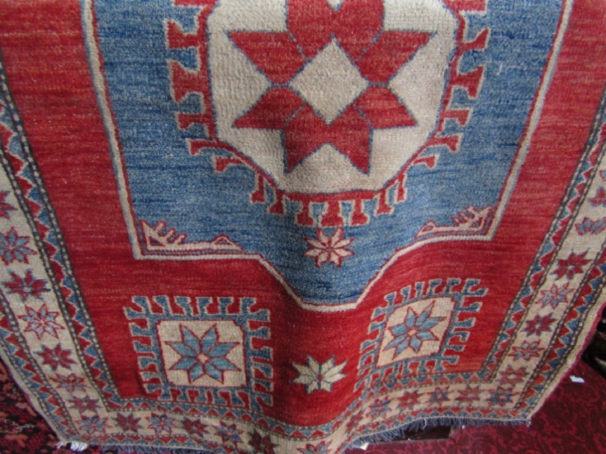 Appraisal: A good quality eastern wool work rug with central blue