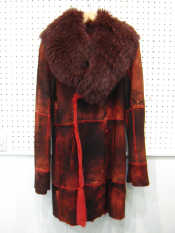 Appraisal: A fox fur and red leather length medium sized coat