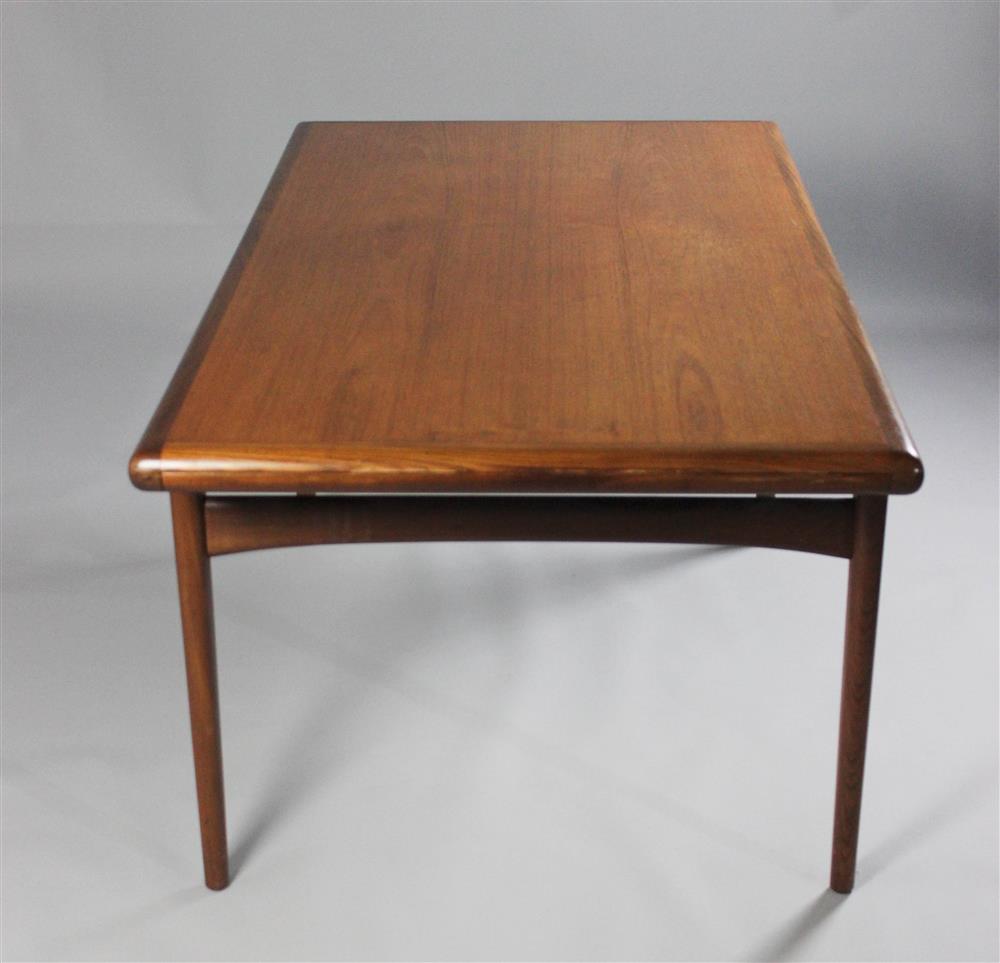 Appraisal: MID-CENTURY MODERN TEAK EXTENSION DINING TABLE framed molded edge with