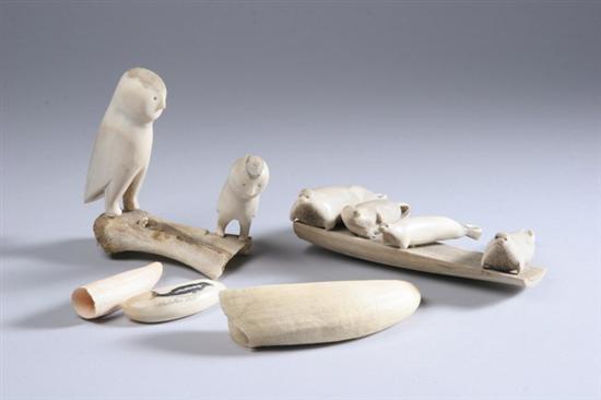 Appraisal: THREE ASSORTED WHALE'S TEETH AND TWO BONE CARVINGS One tooth