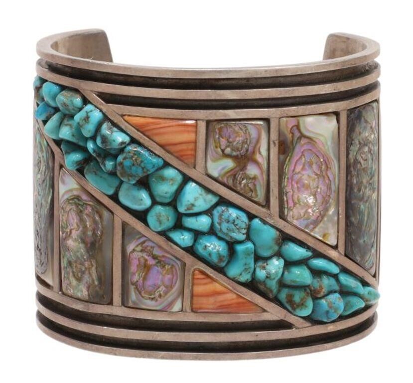 Appraisal: Native American sterling silver cuff bracelet inlaid with abalone plaques