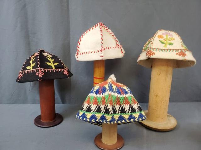 Appraisal: Group of vintage handmade beanie style hats are made from