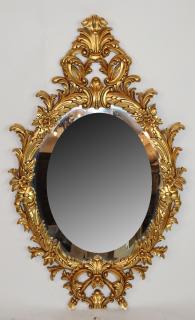 Appraisal: Ornate gilt oval mirror Ornate gold oval mirror h x