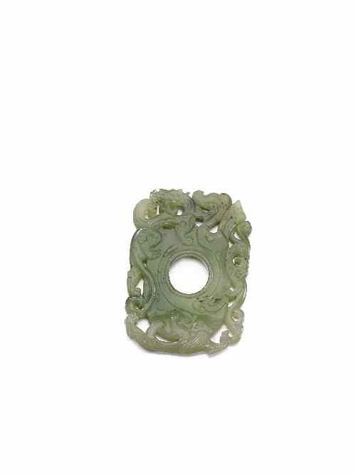 Appraisal: A Chinese spinach jade plaque in the archaistic style carved