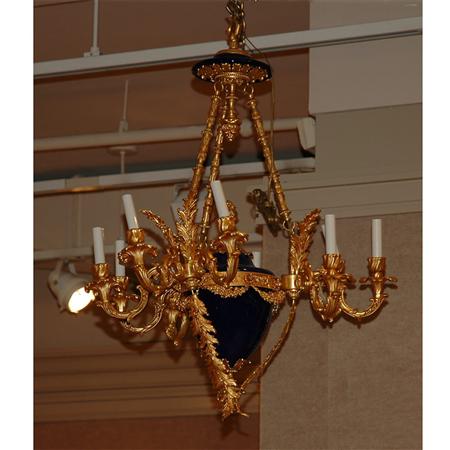 Appraisal: Empire Style Gilt-Metal and Porcelain Nine-Light Chandelier Estimate -