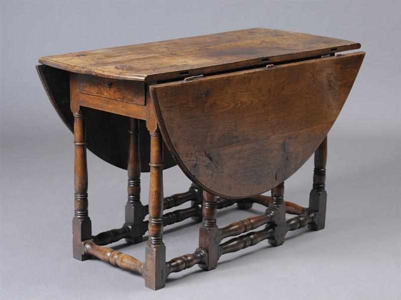 Appraisal: WILLIAM AND MARY STYLE CARVED OAK GATE LEG TABLE The