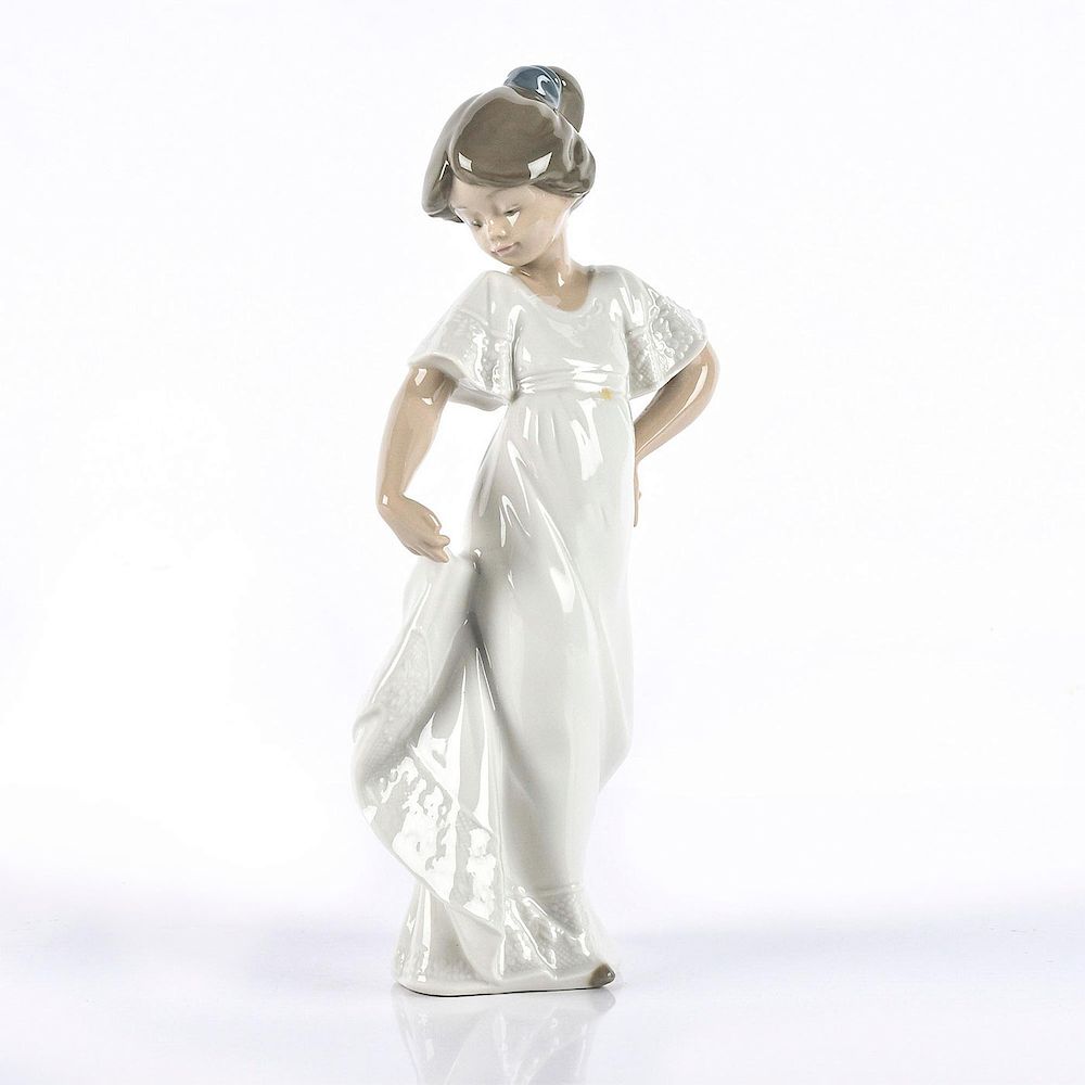 Appraisal: NAO BY LLADRO FIGURINE HOW PRETTY Young girl in white