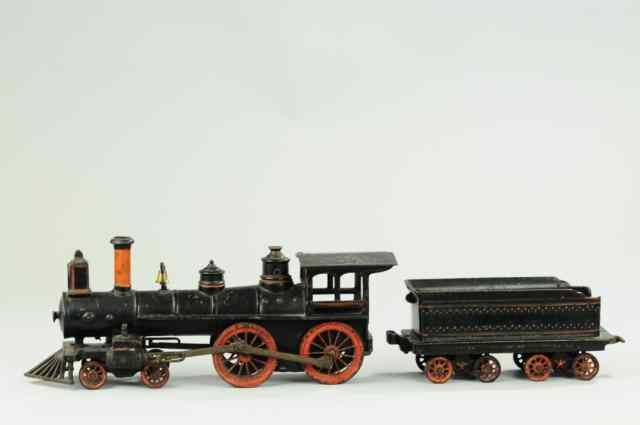 Appraisal: WILKENS LOCOMOTIVE AND TENDER Early cast iron floor train -