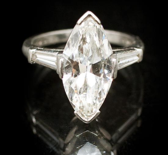 Appraisal: Platinum and diamond ring marquise-cut diamond approximately cts flanked by