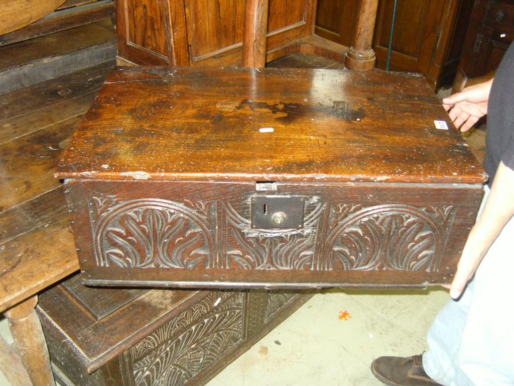 Appraisal: A Georgian oak box with rising lid iron work lock