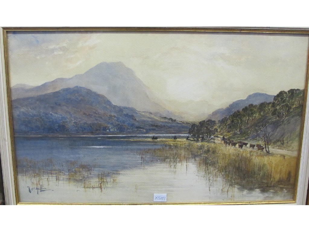 Appraisal: THOMAS SWIFT HUTTON Watercolour highland landscape with cattle by a