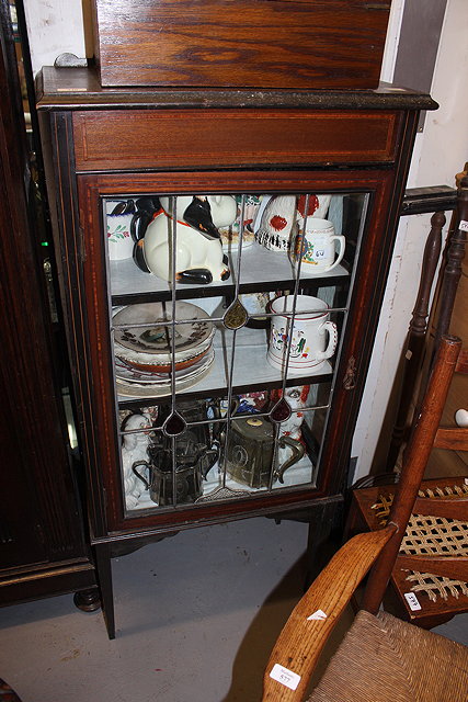 Appraisal: AN EDWARDIAN MAHOGANY SATINWOOD DISPLAY CABINET with leaded glass door