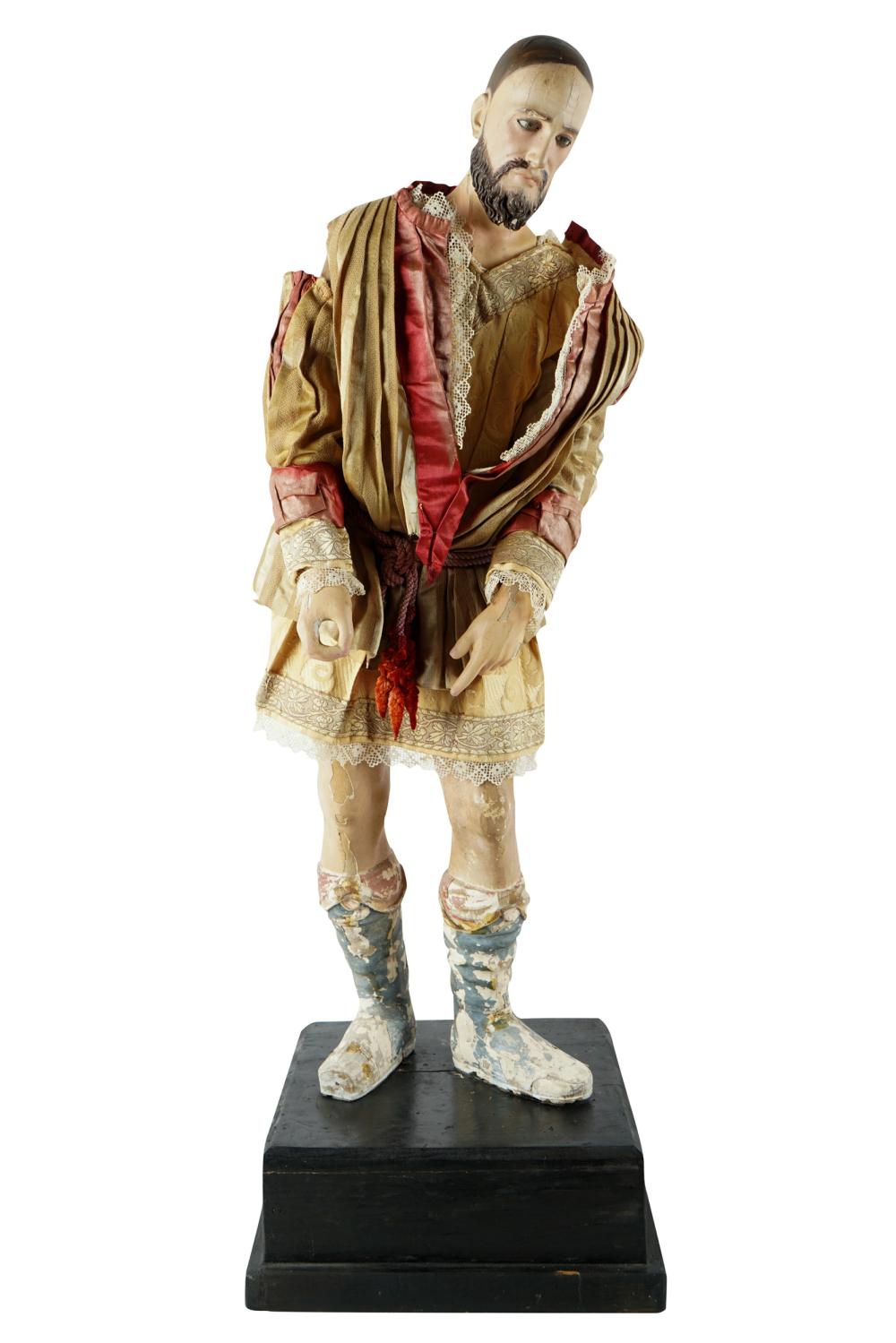 Appraisal: COLONIAL CARVED POLYCHROME FIGURE OF SAINT ROCHthe figure dressed in