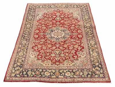 Appraisal: An Isfahan Rug Floral design in navy red yellow and