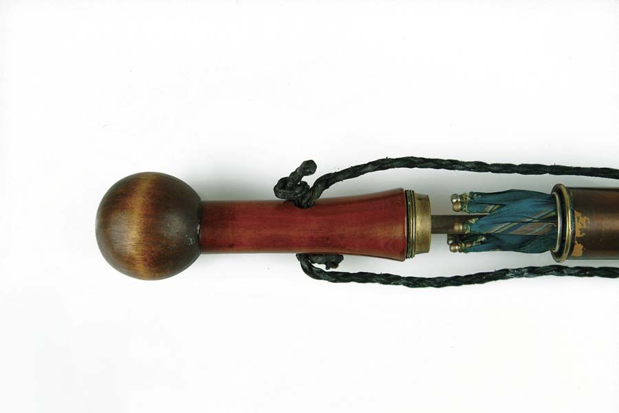 Appraisal: UMBRELLA CANE th C with wood knob top and brass