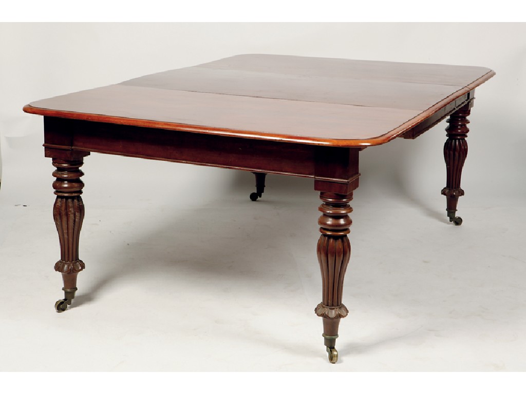 Appraisal: A REGENCY MAHOGANY EXTENDING DINING TABLE the rectangular top with