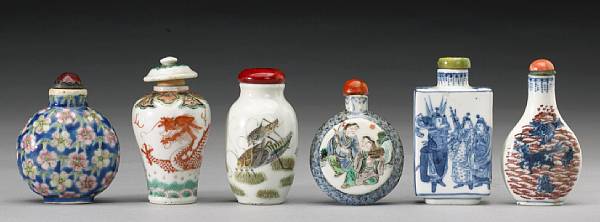 Appraisal: Five enameled porcelain snuff bottles th Century The first decorated