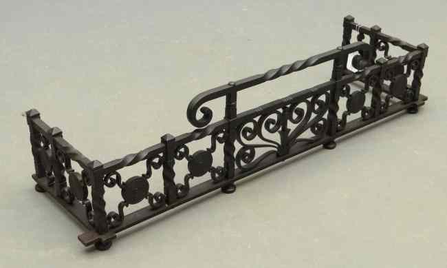 Appraisal: th c fireplace wrought iron fireplace fender dated ''Sept ''