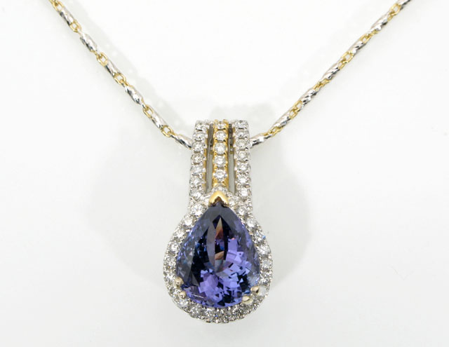 Appraisal: TANZANITE DIAMOND AND FOURTEEN KARAT GOLD PENDANT NECKLACE The pendant