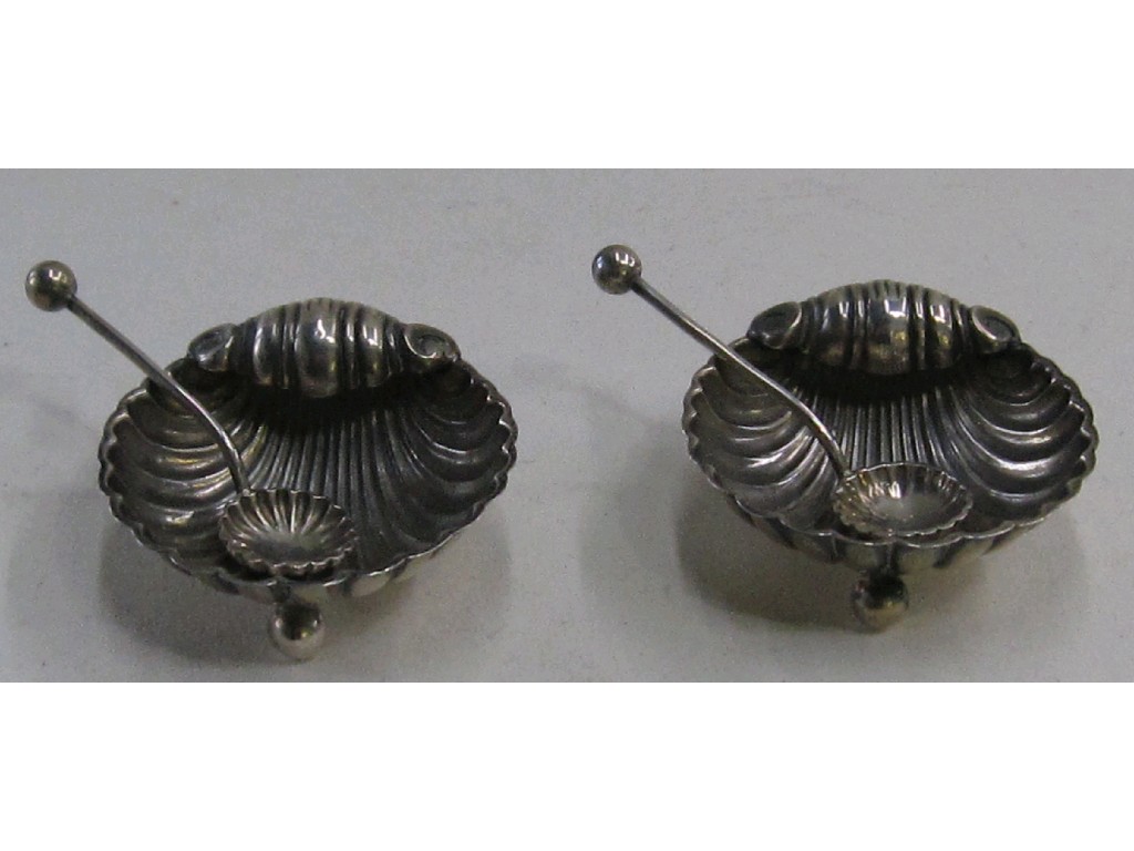 Appraisal: Pair of silver shell shaped silver salts with servers Birmingham