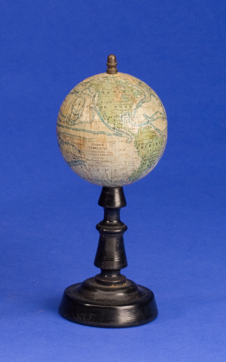 Appraisal: THREE-INCH TERRESTRIAL GLOBE ON A TURNED AND EBONIZED WOODEN STAND