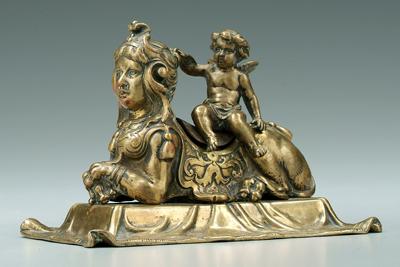 Appraisal: Brass sphinx inkwell recumbent female sphinx on draped base hinged