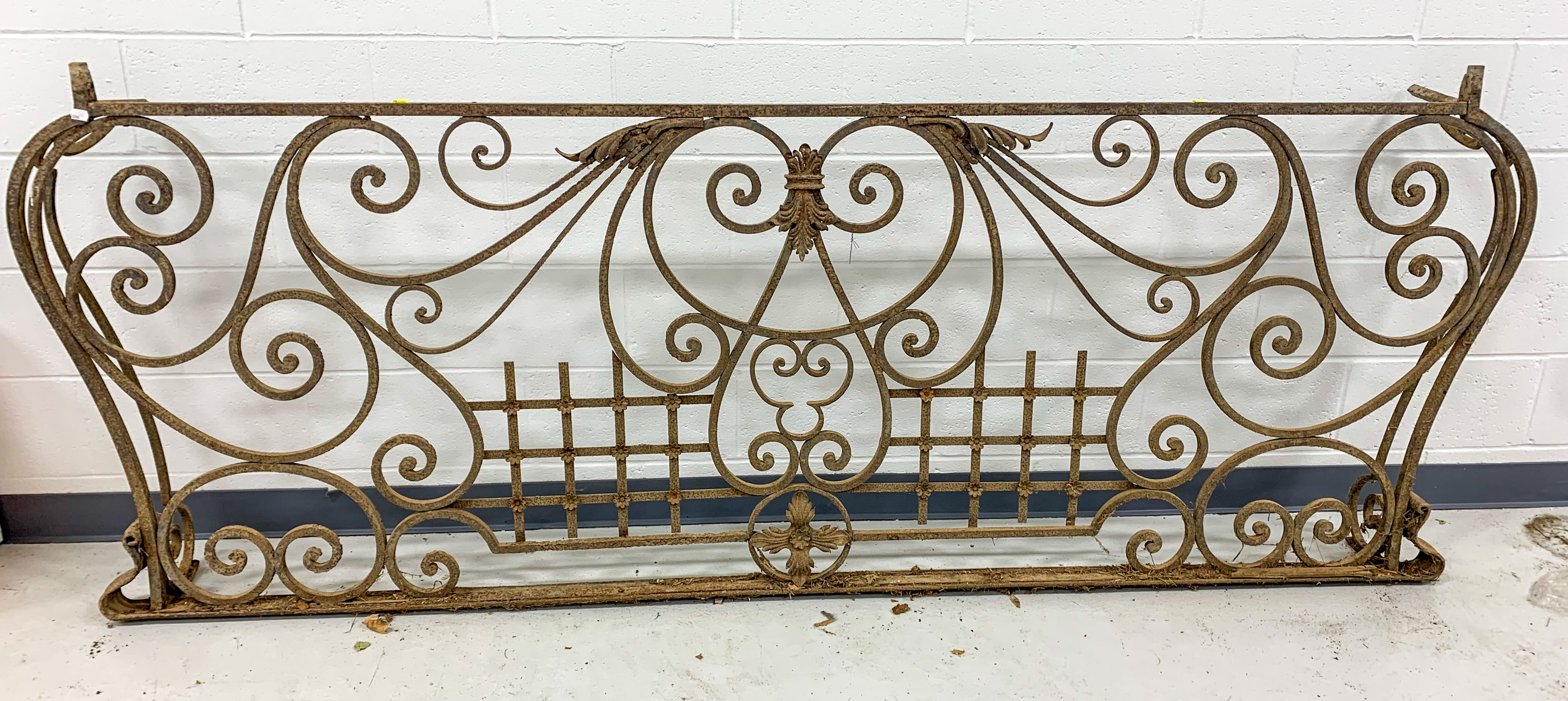 Appraisal: A LARGE WROUGHT IRON WINDOW GATE Late th century in