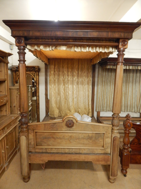 Appraisal: A William IV mahogany four post bed with moulded upholstered