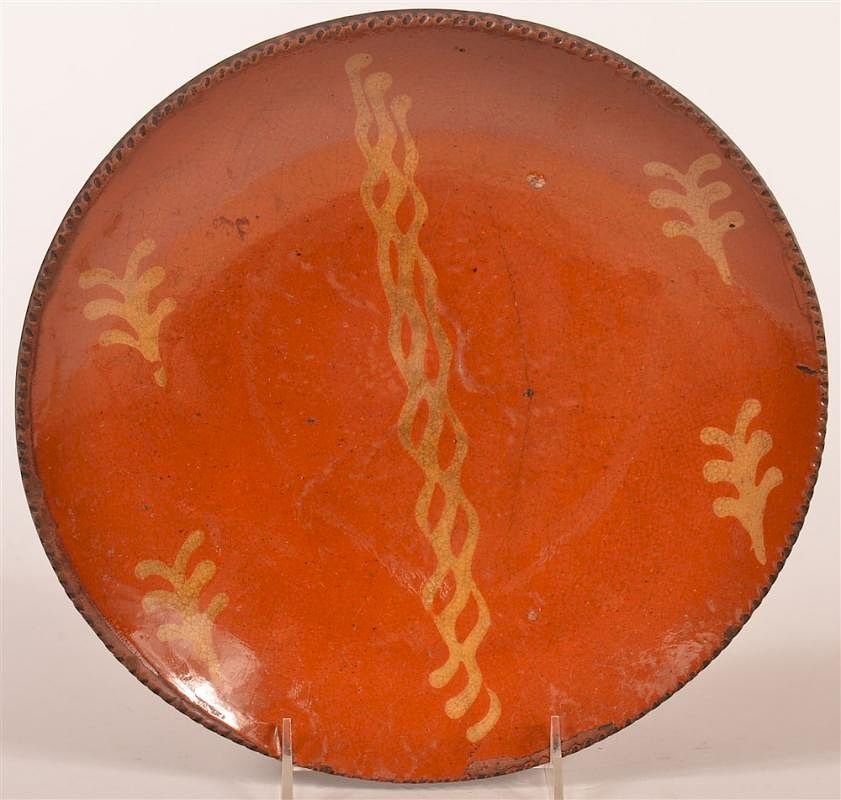 Appraisal: th C PA Redware Pottery Slip Decorated Plate th C